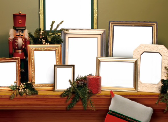 christmas mantel with photoframes toy solidier
