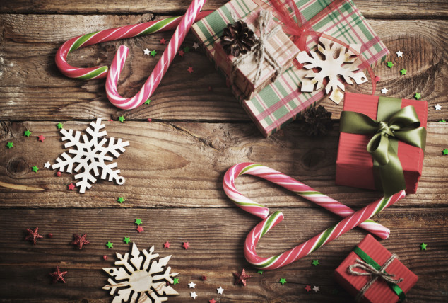 Merry Christmas presents candy canes wood table