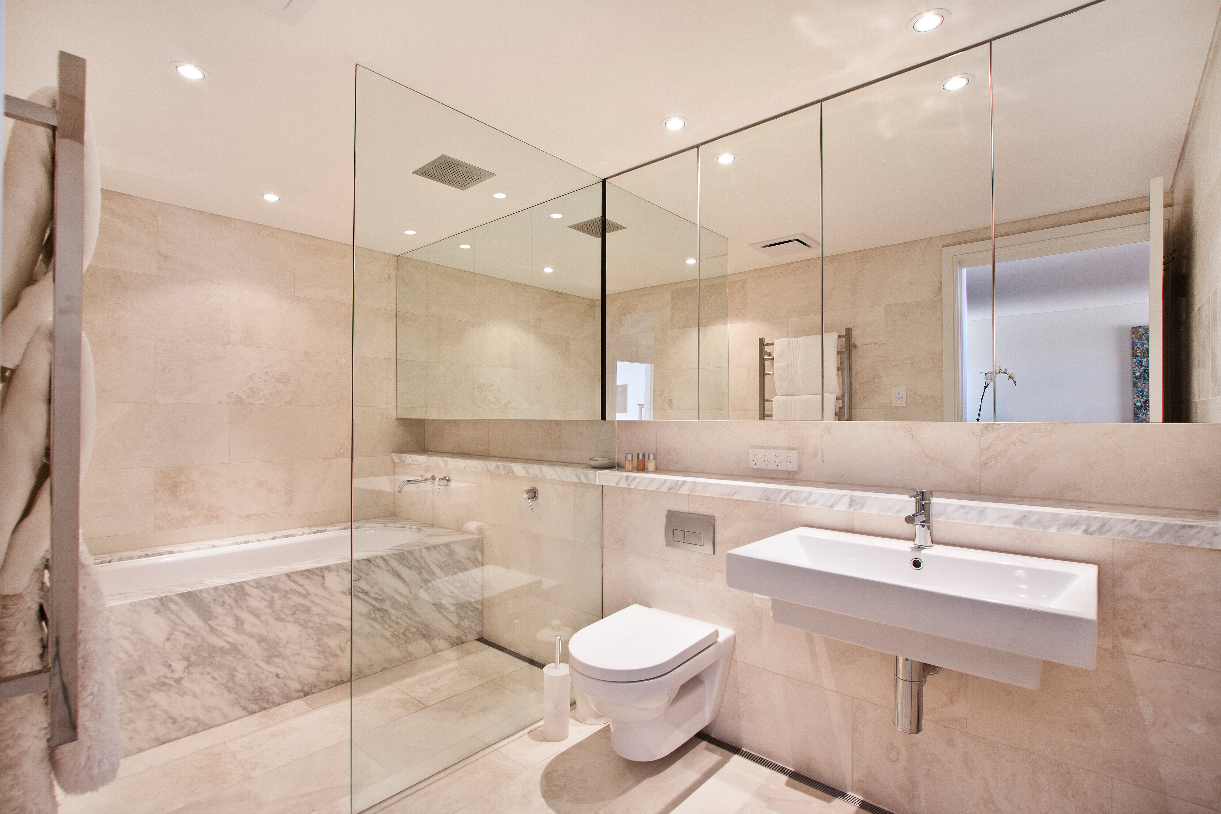 sandstone tile bathroom